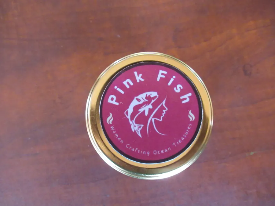 The Pink Fish logo on a jar lid
